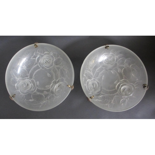 658 - A pair of Art Deco frosted and moulded glass plafonniers