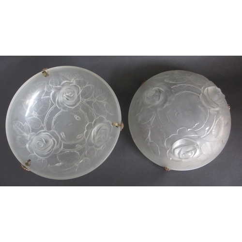 658 - A pair of Art Deco frosted and moulded glass plafonniers