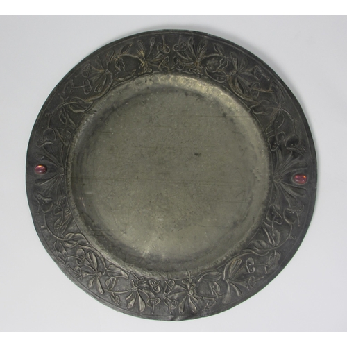 659 - An Arts and Crafts pewter dish