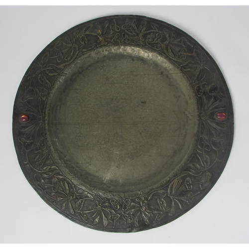 659 - An Arts and Crafts pewter dish