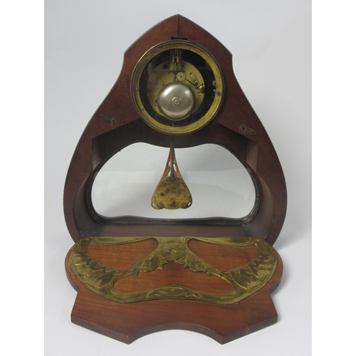 660 - A Continental Art Nouveau mahogany and gilt metal mantle clock