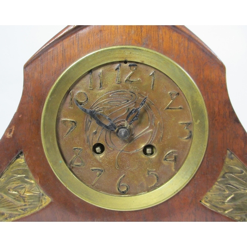 660 - A Continental Art Nouveau mahogany and gilt metal mantle clock