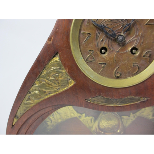 660 - A Continental Art Nouveau mahogany and gilt metal mantle clock