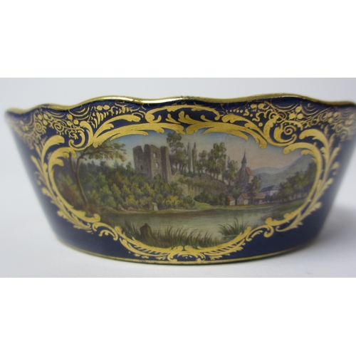 668 - A Meissen dish painted with Tharandt Castle