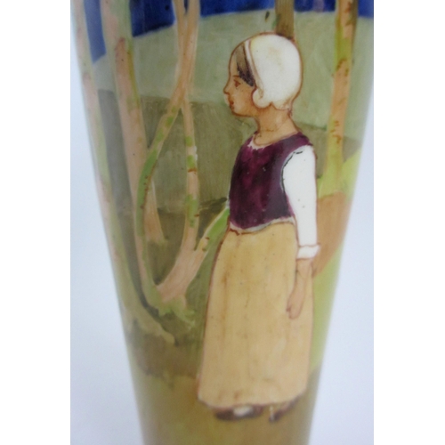 669 - A vase painted with a Dutch girl