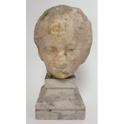 675 - A Roman marble head of a young boy