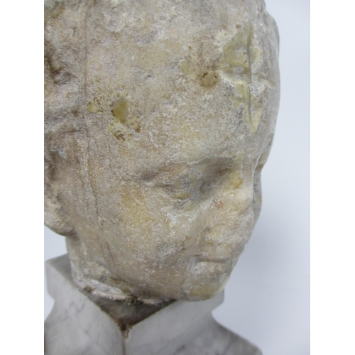 675 - A Roman marble head of a young boy