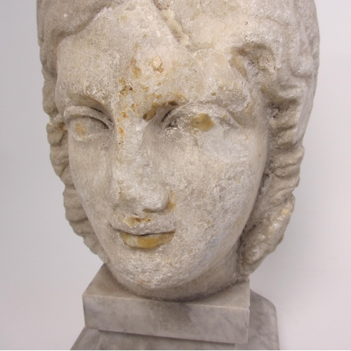 676 - A Roman marble head possibly of Victory