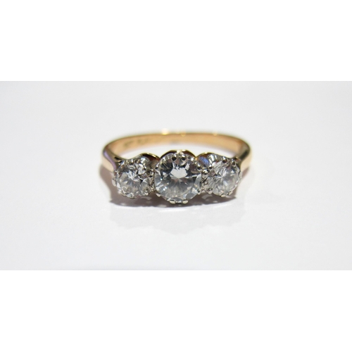 68 - A diamond three stone ring