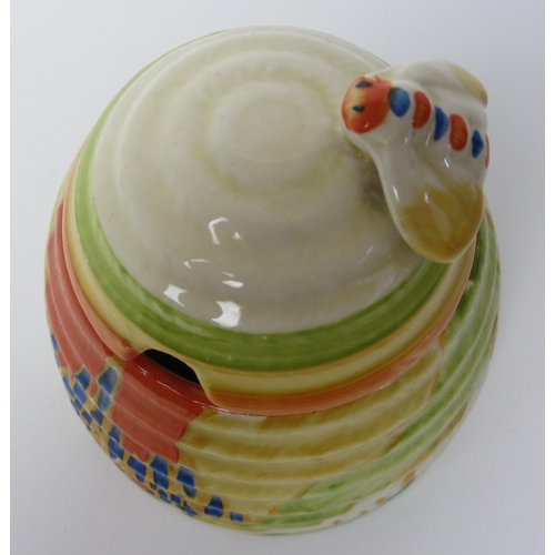 687 - A Clarice Cliff Windbells pattern beehive honey pot