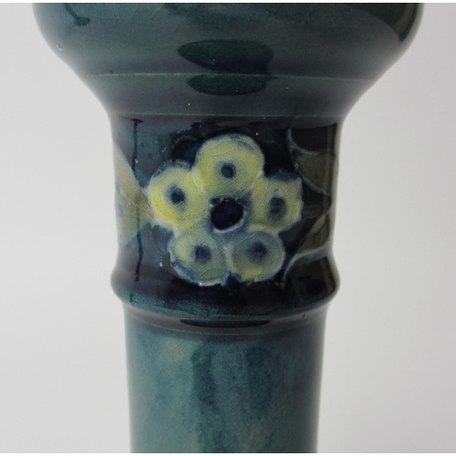 688 - A pair of Moorcroft Later Florian Forget-Me-Not pattern candlesticks