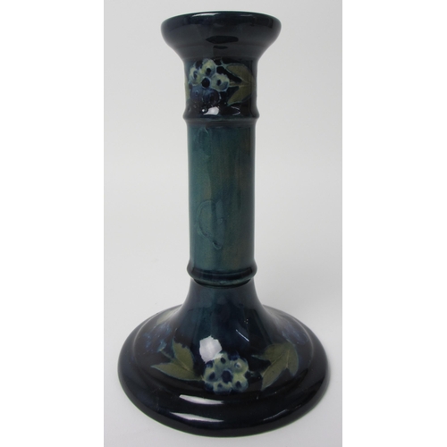 688 - A pair of Moorcroft Later Florian Forget-Me-Not pattern candlesticks