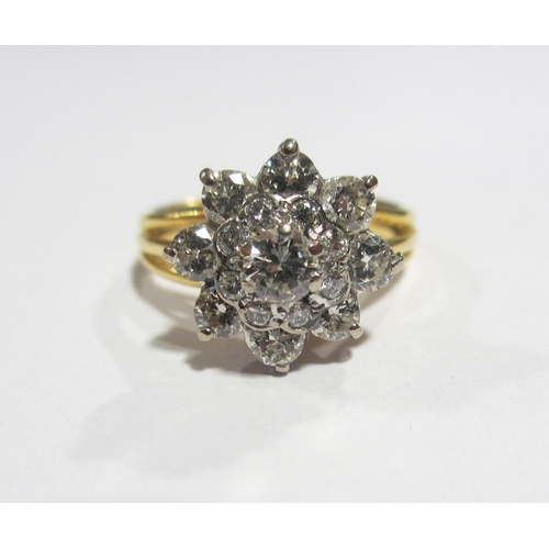 69 - A diamond flower head cluster ring