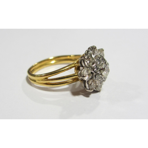 69 - A diamond flower head cluster ring