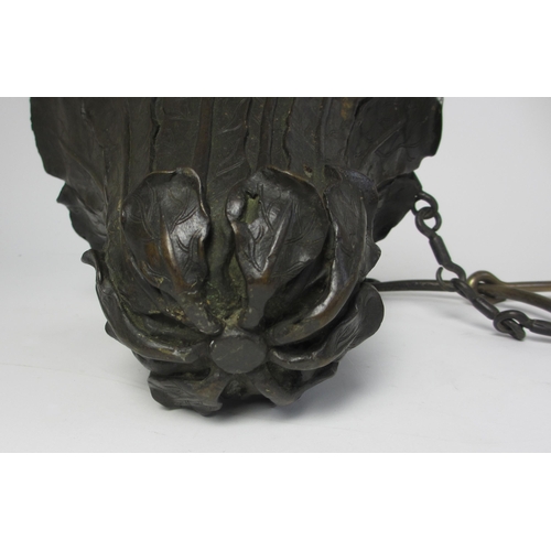 692 - A pair of bronze hanging planters