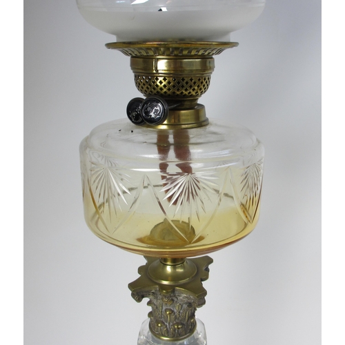 693 - A Victorian cut glass oil lamp