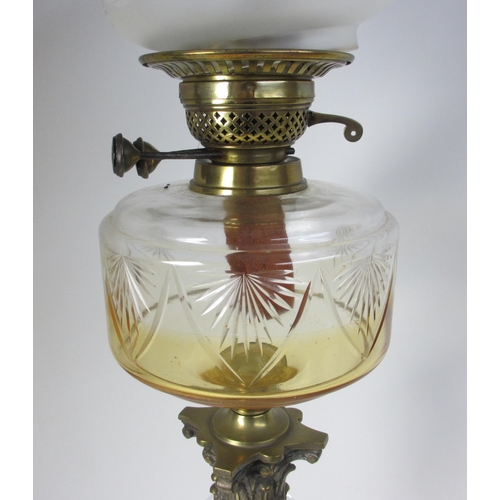 693 - A Victorian cut glass oil lamp