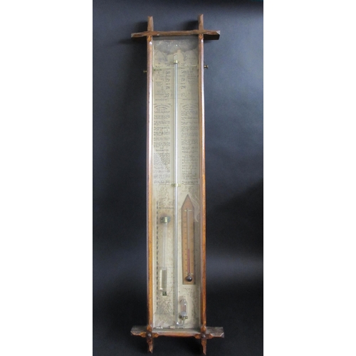 694 - An Admiral Fitzroy oak cased barometer and thermometer