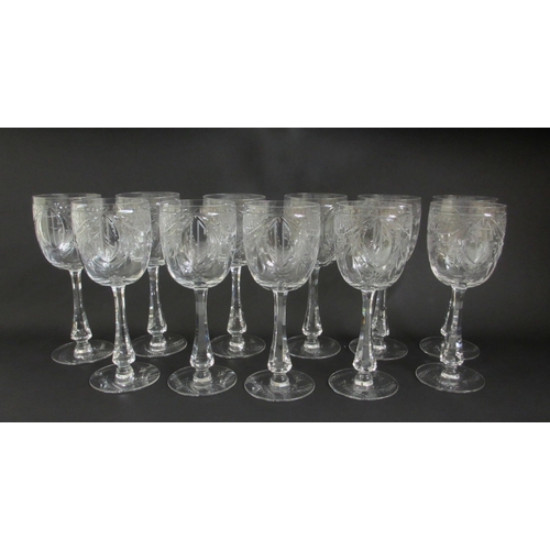 696 - A Bohemian cut lead crystal fruit bowl and eleven wine glasses