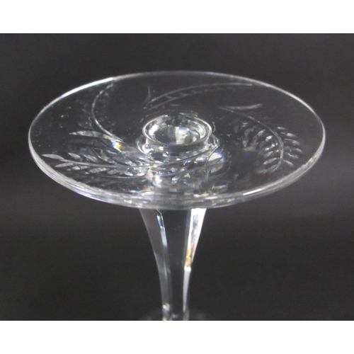 696 - A Bohemian cut lead crystal fruit bowl and eleven wine glasses