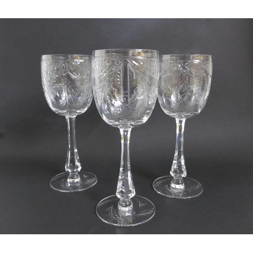 696 - A Bohemian cut lead crystal fruit bowl and eleven wine glasses