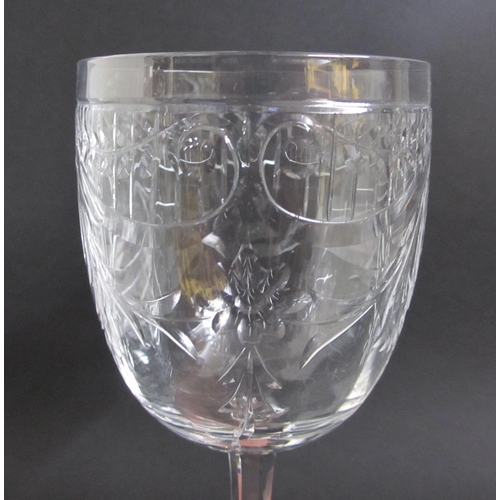 696 - A Bohemian cut lead crystal fruit bowl and eleven wine glasses