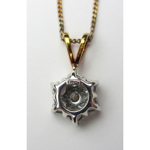 71 - A diamond flower head pendant