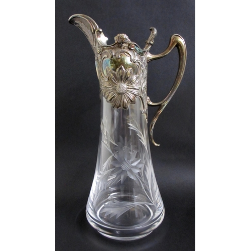 710 - A Continental Art Nouveau electroplated claret decanter