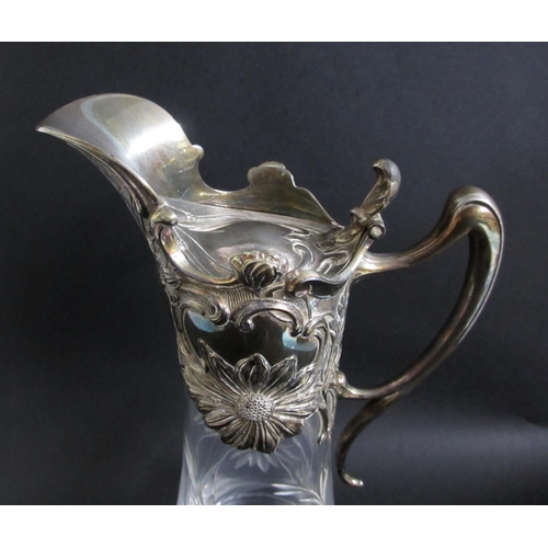 710 - A Continental Art Nouveau electroplated claret decanter