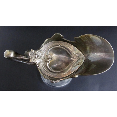 710 - A Continental Art Nouveau electroplated claret decanter