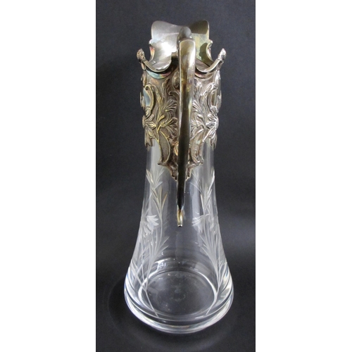 710 - A Continental Art Nouveau electroplated claret decanter