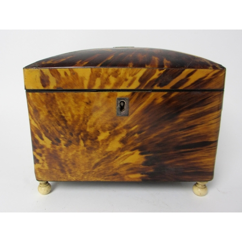 711 - A George III tortoiseshell domed tea caddy