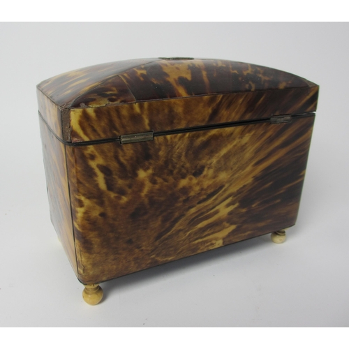 711 - A George III tortoiseshell domed tea caddy