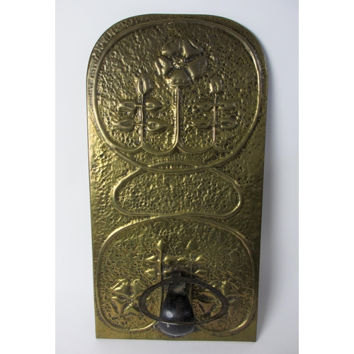 765 - A Glasgow style brass and iron sconce