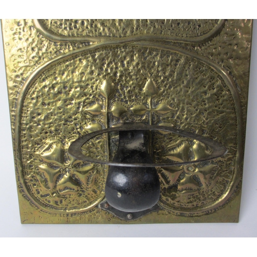 765 - A Glasgow style brass and iron sconce