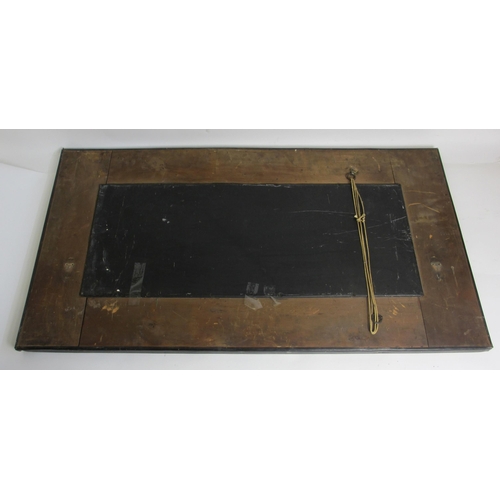 771 - A Glasgow style embossed brass tall rectangular wall mirror