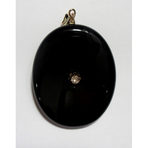 80 - A Victorian black onyx and diamond pendant