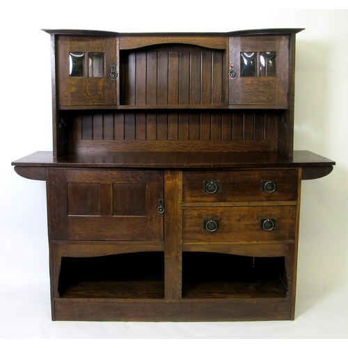 815 - An Arts and Crafts oak overmantel sideboard in the Glasgow style