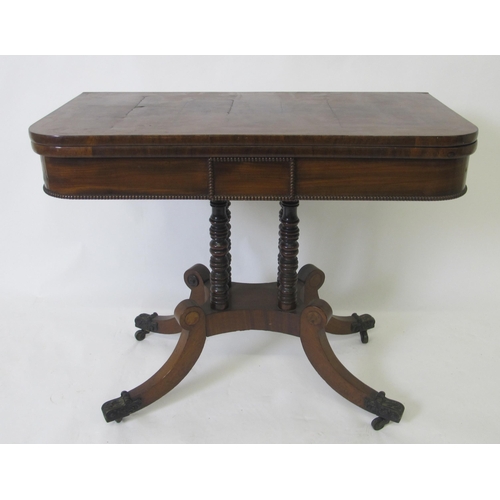 818 - A Victorian mahogany turnover card table