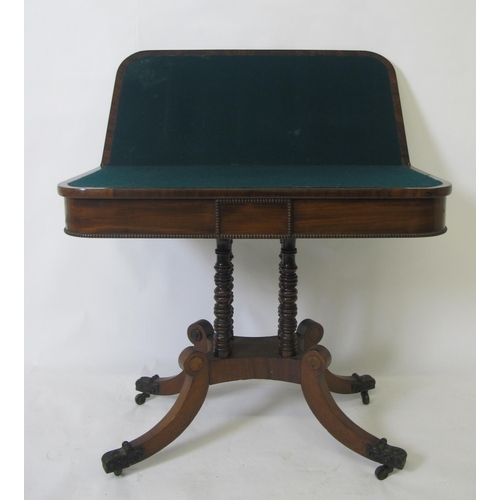 818 - A Victorian mahogany turnover card table