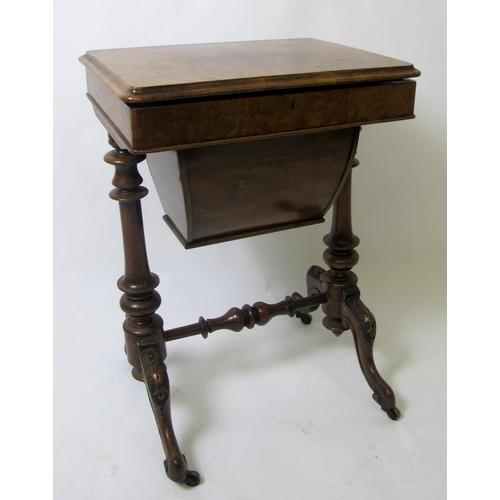 823 - A Victorian walnut sewing table