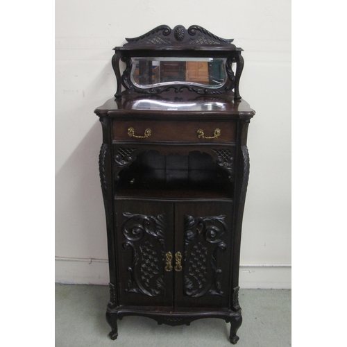 824A - An Edwardian mahogany music cabinet