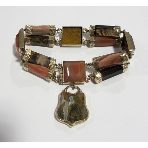 83 - A Victorian engraved gold Scottish agate bracelet