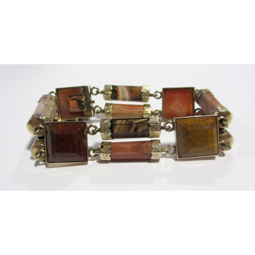 83 - A Victorian engraved gold Scottish agate bracelet