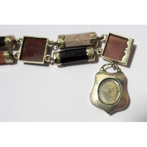 83 - A Victorian engraved gold Scottish agate bracelet