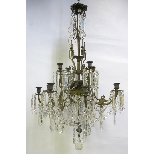 831 - An ornate cut glass chandelier