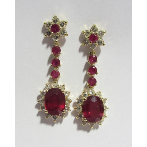 95 - A fine pair of ruby and diamond pendant earrings