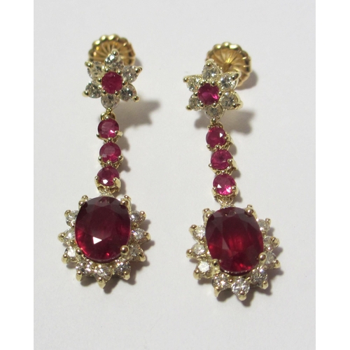 95 - A fine pair of ruby and diamond pendant earrings