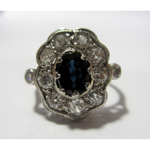 98 - A sapphire and diamond ring