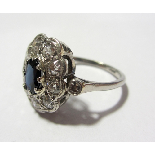 98 - A sapphire and diamond ring